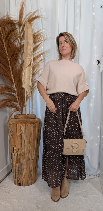 Pull avec manches à boutons dorés