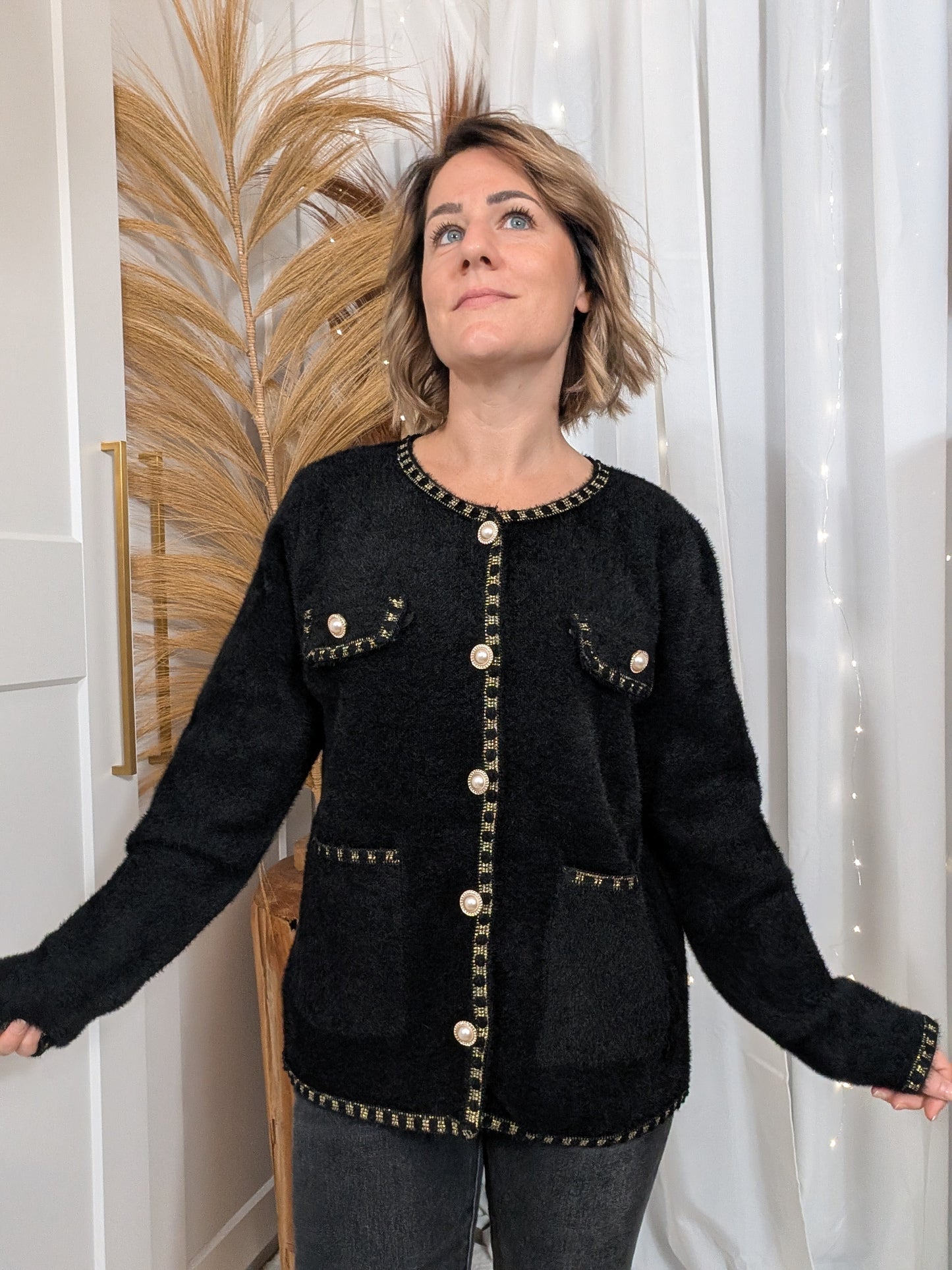 Gilet noir boutons dorés