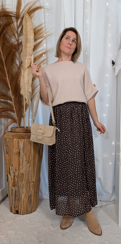 Pull avec manches à boutons dorés